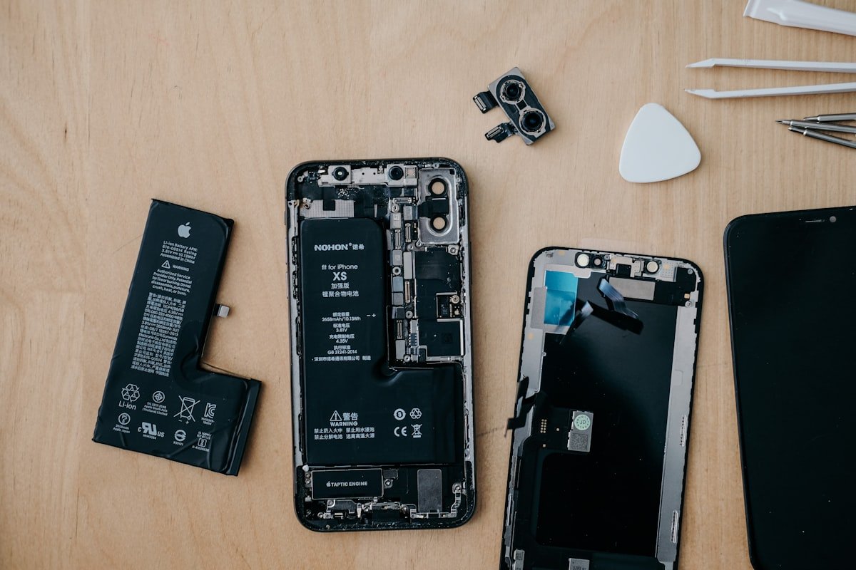 Redmi phone repair in progress on a work bench