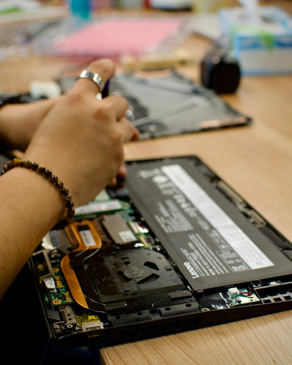 Alienware gaming laptop repair in progress on a work bench