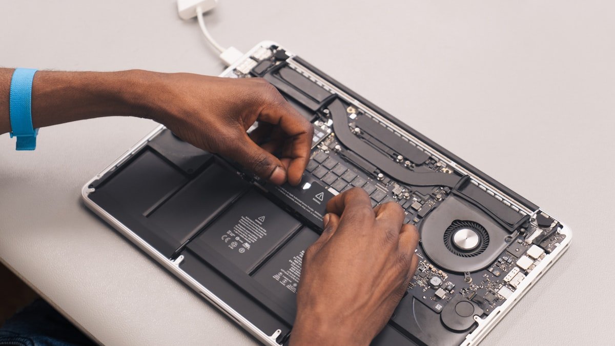 MacBook repair service on a work bench